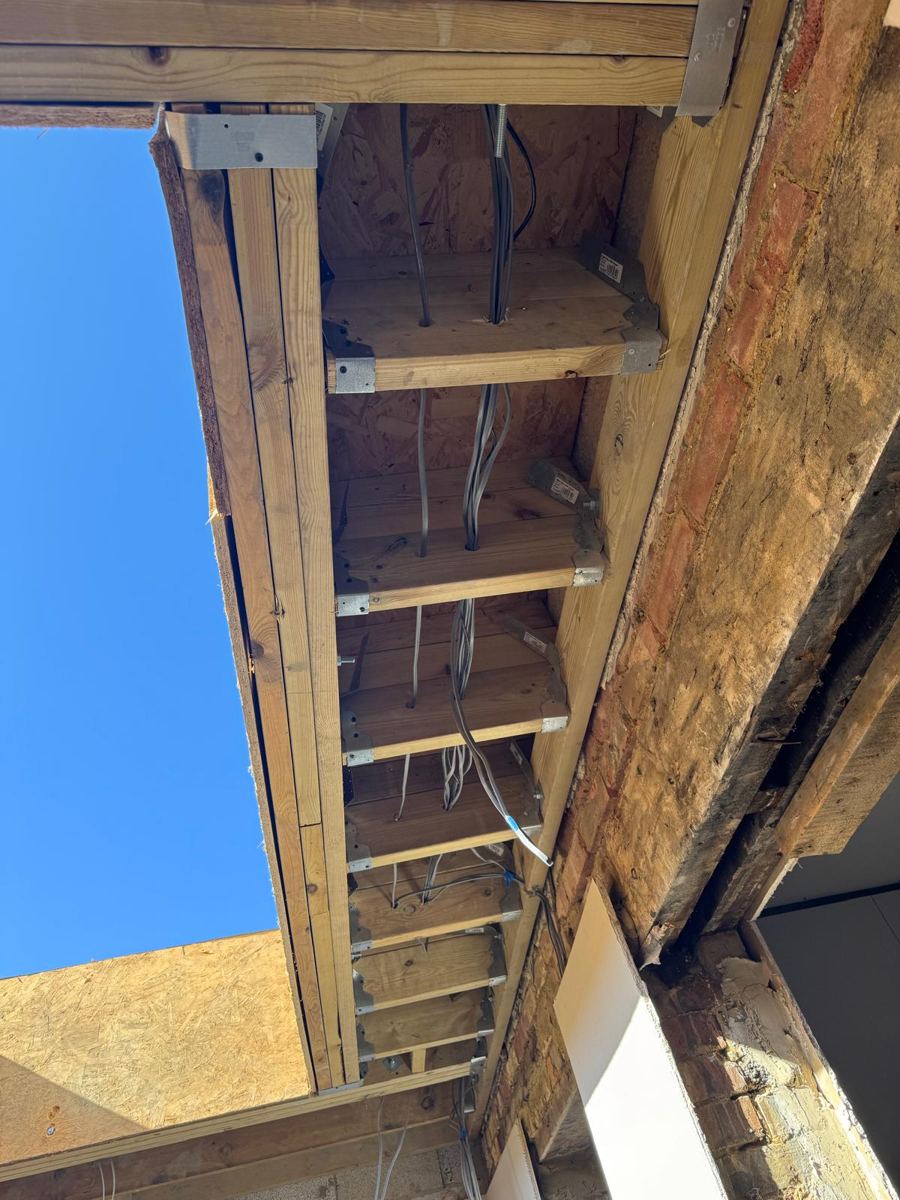 First-fix cables run through the new roof joists
