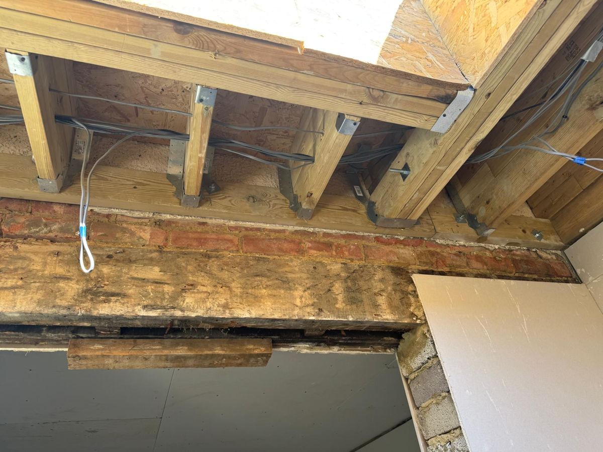 Rooflight opening formed in the new flat roof